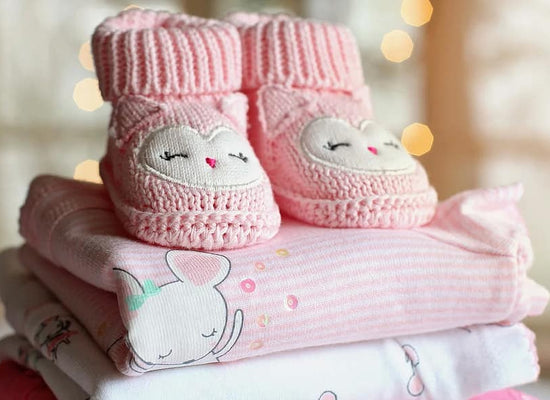 From Baby Sleepsuits To Dresses: A New Parent's Guide To Newborn Fashion Essentials