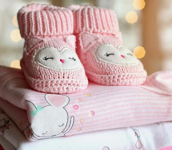 From Baby Sleepsuits To Dresses: A New Parent's Guide To Newborn Fashion Essentials